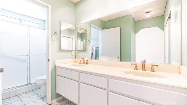 7339 Greenbriar Pl, Rancho Cucamonga, CA 91730 - bathroom featuring double vanity and a shower stall