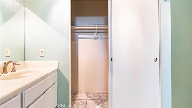 7339 Greenbriar Pl, Rancho Cucamonga, CA 91730 - bathroom featuring vanity and a textured wall