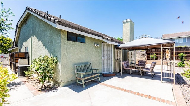 7339 Greenbriar Pl, Rancho Cucamonga, CA 91730 - view of patio / terrace with a gazebo and outdoor dining area