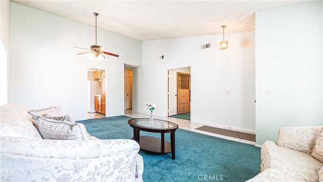 7339 Greenbriar Pl, Rancho Cucamonga, CA 91730 - living room featuring a ceiling fan, carpet, and high vaulted ceiling