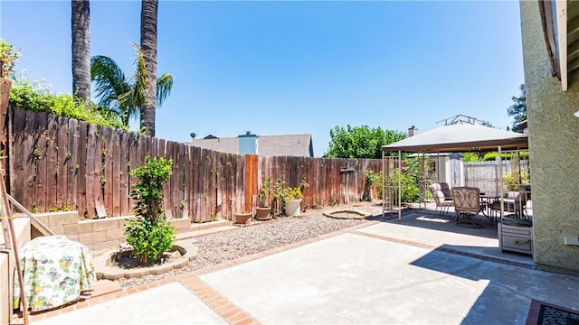 7339 Greenbriar Pl, Rancho Cucamonga, CA 91730 - fenced backyard with a gazebo, a patio area, and outdoor dining space