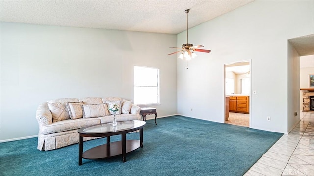 7339 Greenbriar Pl, Rancho Cucamonga, CA 91730 - living room featuring a ceiling fan, a textured ceiling, high vaulted ceiling, and light carpet