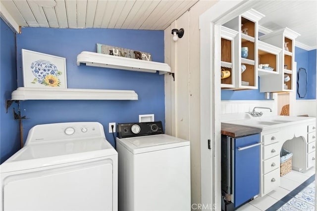 2725 W Sacramento Ave, Chico, CA 95973 - laundry room with washing machine and clothes dryer, light tile patterned flooring, wainscoting, and wood ceiling