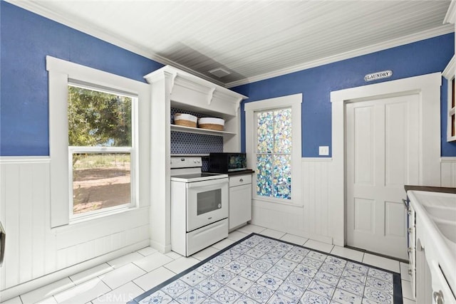 2725 W Sacramento Ave, Chico, CA 95973 - kitchen featuring electric range, light tile patterned floors, a wainscoted wall, open shelves, and crown molding