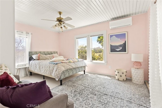 2725 W Sacramento Ave, Chico, CA 95973 - bedroom with a wall mounted AC, carpet flooring, and a ceiling fan