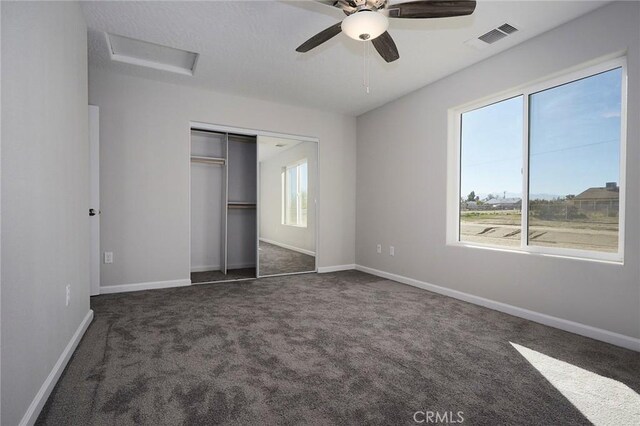 18238 Talisman St, Hesperia, CA 92345 - unfurnished bedroom with carpet floors, attic access, a closet, and ceiling fan