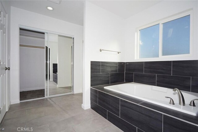 18238 Talisman St, Hesperia, CA 92345 - bathroom featuring a bath, tile patterned flooring, and recessed lighting