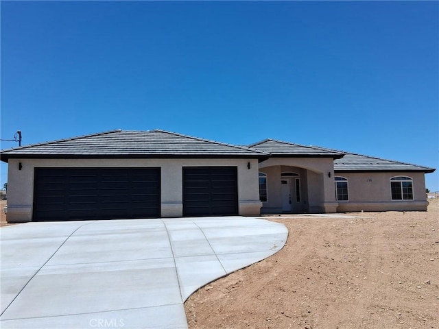 18420 Wisteria St, Hesperia, CA 92345 - single story home featuring driveway, an attached garage, and stucco siding