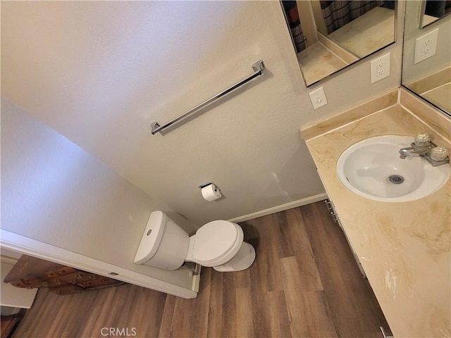 15420 Apache Rd, Apple Valley, CA 92307 - bathroom with wood finished floors and vanity
