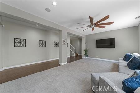 11126 Whitebark Ln, Corona, CA 92883 - living room featuring a ceiling fan, stairway, carpet, and recessed lighting