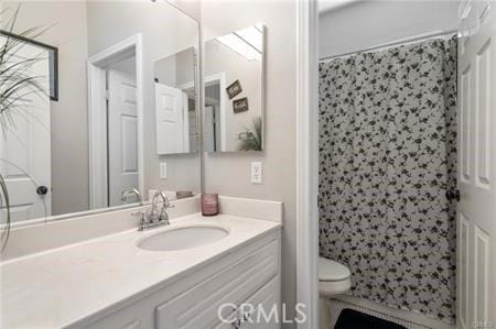 11126 Whitebark Ln, Corona, CA 92883 - full bath with vanity and a shower with curtain