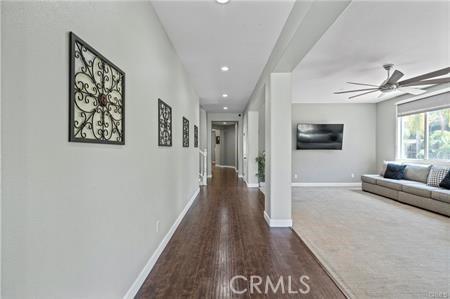 11126 Whitebark Ln, Corona, CA 92883 - hall featuring dark wood-type flooring and recessed lighting