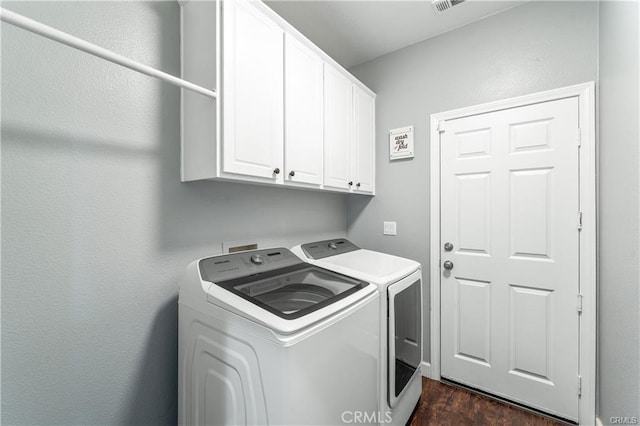 11126 Whitebark Ln, Corona, CA 92883 - laundry room featuring cabinet space, separate washer and dryer, and dark wood-type flooring
