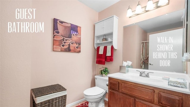 15927 Alta Vista Dr Unit D, La Mirada, CA 90638 - bathroom featuring toilet and vanity