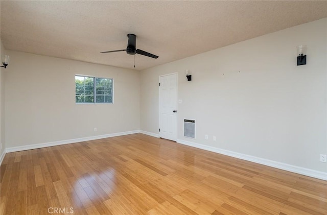 11162 Barman Ave, Culver City, CA 90230 - unfurnished room featuring ceiling fan, light wood finished floors, and a textured ceiling