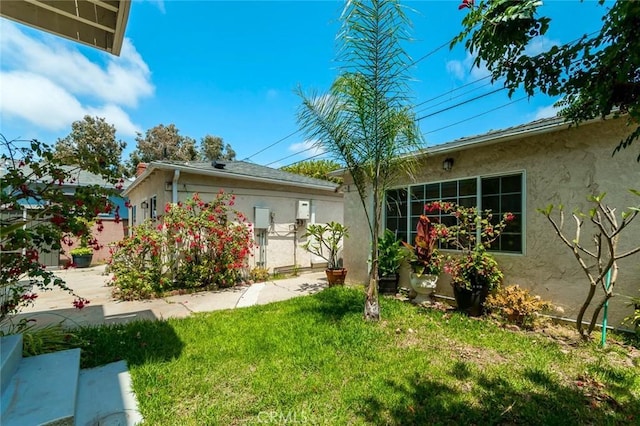 11162 Barman Ave, Culver City, CA 90230 - view of property exterior with stucco siding and a yard