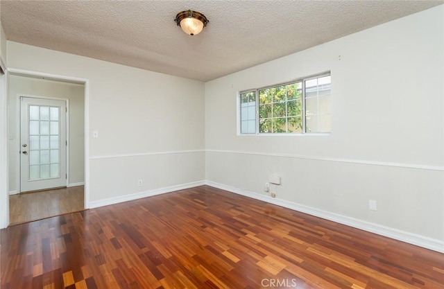 11162 Barman Ave, Culver City, CA 90230 - unfurnished room with wood finished floors and a textured ceiling