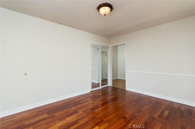 11162 Barman Ave, Culver City, CA 90230 - empty room with wood finished floors and a textured ceiling