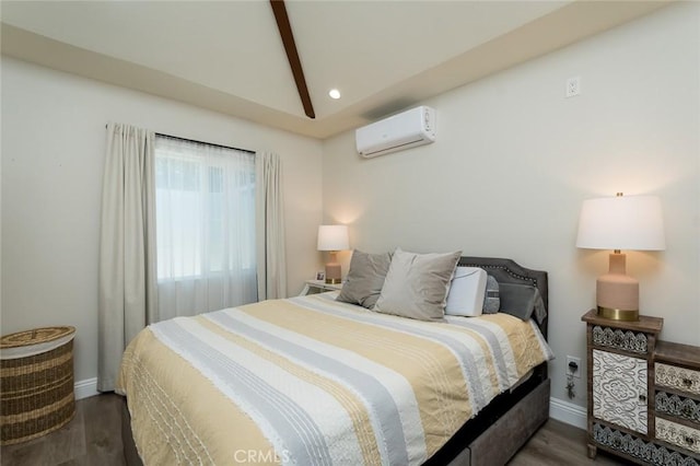 11162 Barman Ave, Culver City, CA 90230 - bedroom with a wall unit AC, wood finished floors, and recessed lighting