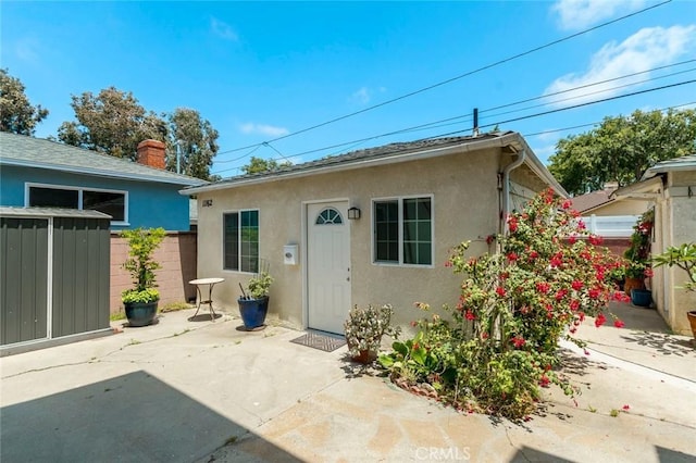 11162 Barman Ave, Culver City, CA 90230 - back of house with a patio area, stucco siding, and an outbuilding