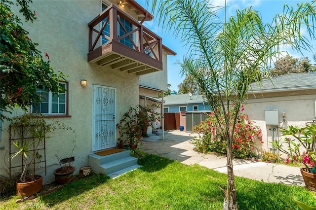 11162 Barman Ave, Culver City, CA 90230 - view of front of property featuring a balcony, stucco siding, and entry steps