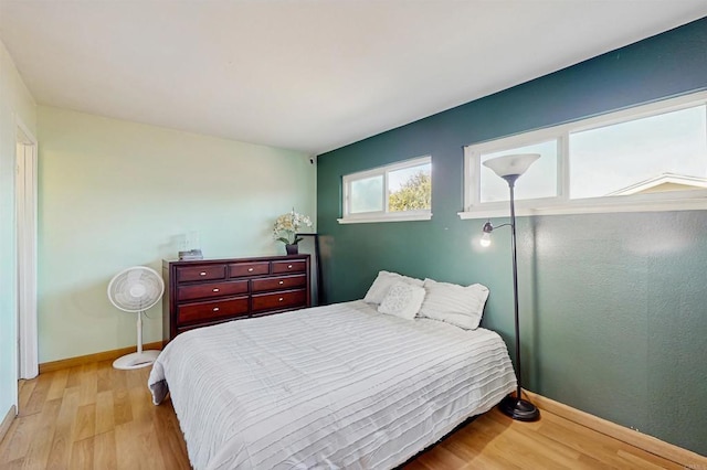 12538 Buckskin Trl, Poway, CA 92064 - bedroom featuring light wood-style flooring and baseboards