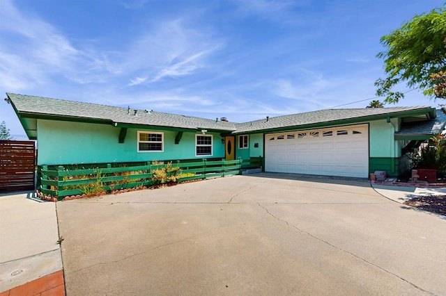 12538 Buckskin Trl, Poway, CA 92064 - ranch-style house with concrete driveway, an attached garage, and stucco siding