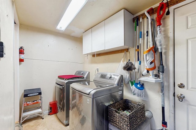 12538 Buckskin Trl, Poway, CA 92064 - laundry area featuring cabinet space, separate washer and dryer, and light tile patterned floors