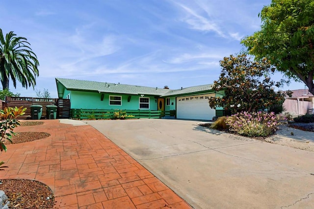 12538 Buckskin Trl, Poway, CA 92064 - ranch-style house with concrete driveway, a garage, and stucco siding