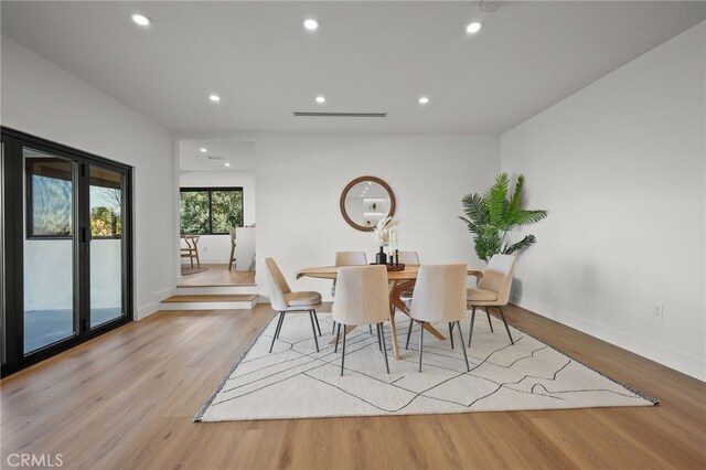 2115 E Santiago St, Covina, CA 91724 - dining room with wood finished floors and recessed lighting