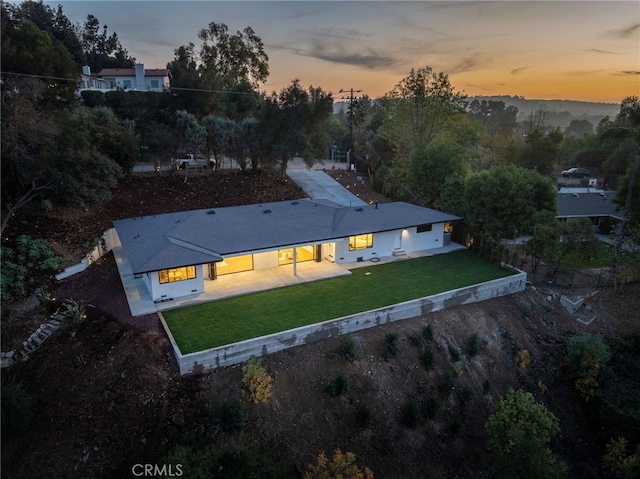 2115 E Santiago St, Covina, CA 91724 - back of house at dusk with a patio