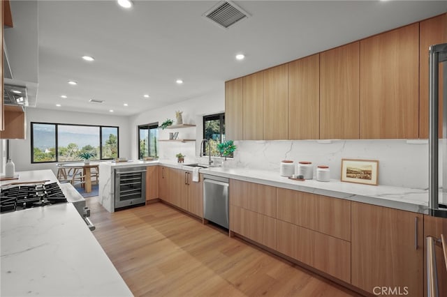 2115 E Santiago St, Covina, CA 91724 - kitchen featuring beverage cooler, modern cabinets, dishwasher, light wood finished floors, and backsplash