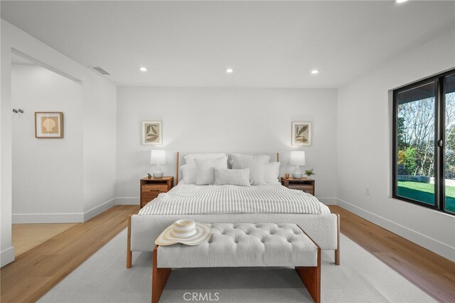 2115 E Santiago St, Covina, CA 91724 - bedroom with recessed lighting and light wood finished floors
