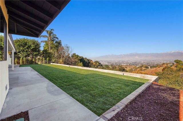2115 E Santiago St, Covina, CA 91724 - view of grassy yard with a mountain view and a patio area