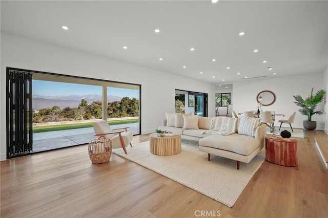 2115 E Santiago St, Covina, CA 91724 - living area with light wood-type flooring, recessed lighting, and a mountain view