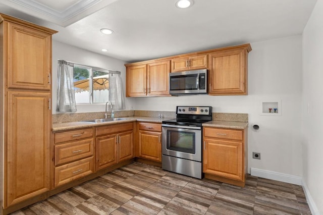 3423 Del Este Way, Oceanside, CA 92056 - kitchen with appliances with stainless steel finishes, light countertops, recessed lighting, and ornamental molding