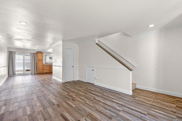 3423 Del Este Way, Oceanside, CA 92056 - unfurnished living room featuring crown molding, stairway, and recessed lighting