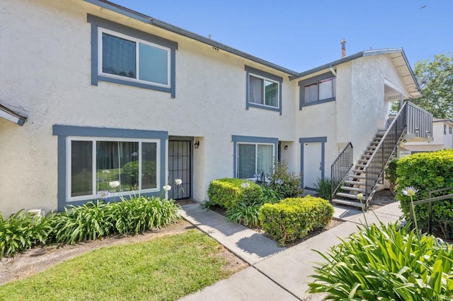 3423 Del Este Way, Oceanside, CA 92056 - view of front of property with stucco siding and stairs