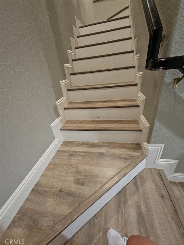 785 Harbor Cliff Way Unit 177, Oceanside, CA 92054 - stairway with a textured wall and wood finished floors