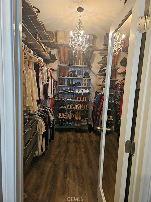 785 Harbor Cliff Way Unit 177, Oceanside, CA 92054 - spacious closet featuring wood finished floors and a chandelier