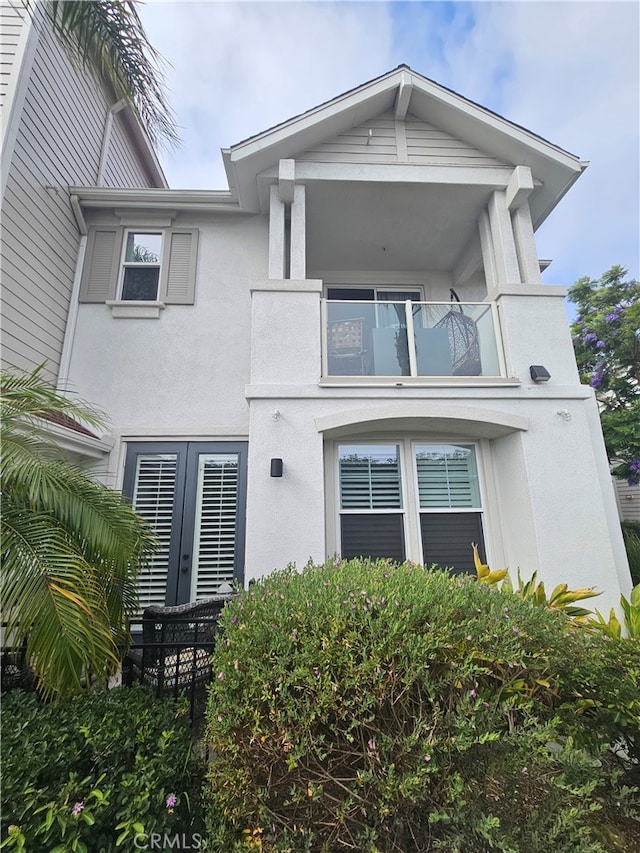 785 Harbor Cliff Way Unit 177, Oceanside, CA 92054 - view of front facade with a balcony and stucco siding