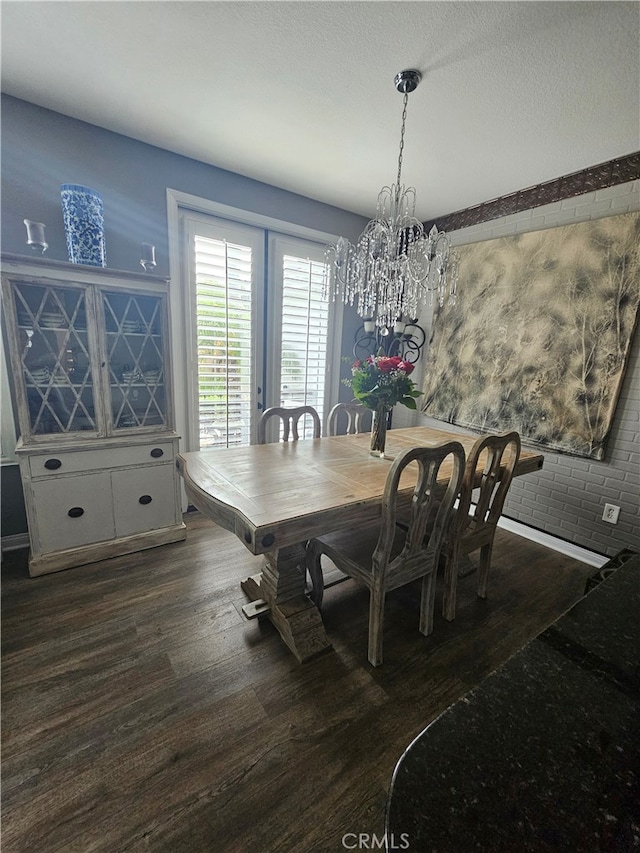 785 Harbor Cliff Way Unit 177, Oceanside, CA 92054 - dining space with dark wood-style flooring, a chandelier, and a textured ceiling