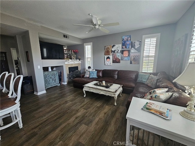 785 Harbor Cliff Way Unit 177, Oceanside, CA 92054 - living room with ceiling fan, dark wood finished floors, and a tiled fireplace