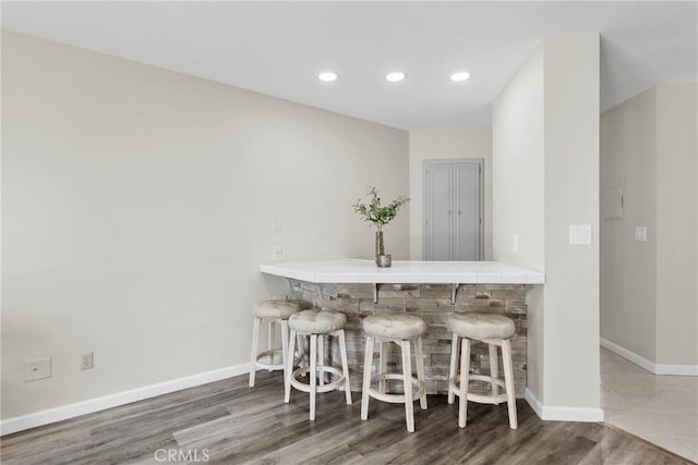 1346 Tourney Hill Ln Unit 67, Nipomo, CA 93444 - bar with wood finished floors and recessed lighting