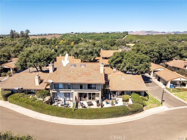 1346 Tourney Hill Ln Unit 67, Nipomo, CA 93444 - view from above of property with a forest