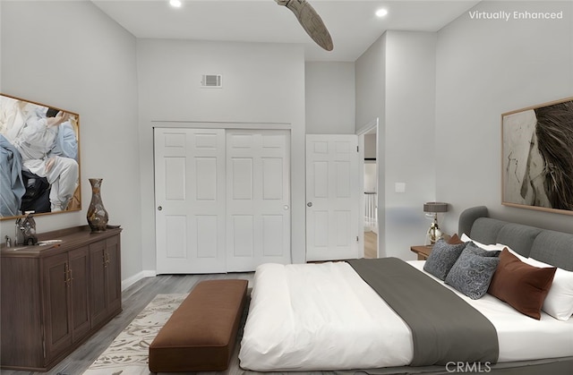 1346 Tourney Hill Ln Unit 67, Nipomo, CA 93444 - bedroom featuring a towering ceiling, light wood-type flooring, a closet, recessed lighting, and ceiling fan