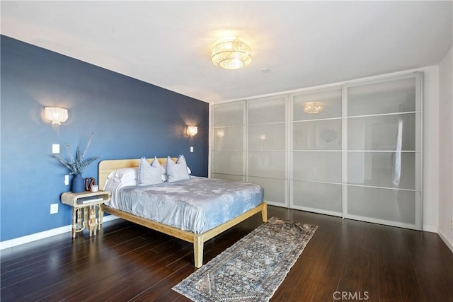 2704 Voorhees Ave Unit 4, Redondo Beach, CA 90278 - bedroom featuring wood finished floors and baseboards