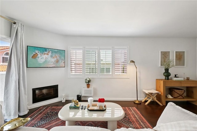 2704 Voorhees Ave Unit 4, Redondo Beach, CA 90278 - living area with a glass covered fireplace and wood finished floors