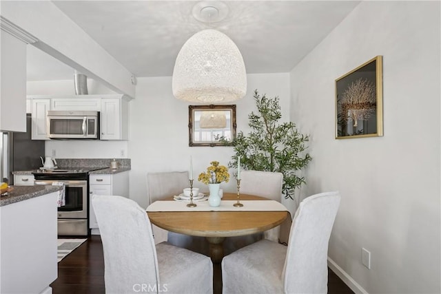 2704 Voorhees Ave Unit 4, Redondo Beach, CA 90278 - dining room with dark wood-type flooring