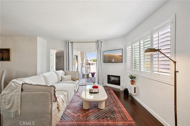 2704 Voorhees Ave Unit 4, Redondo Beach, CA 90278 - living area featuring wood finished floors and a glass covered fireplace